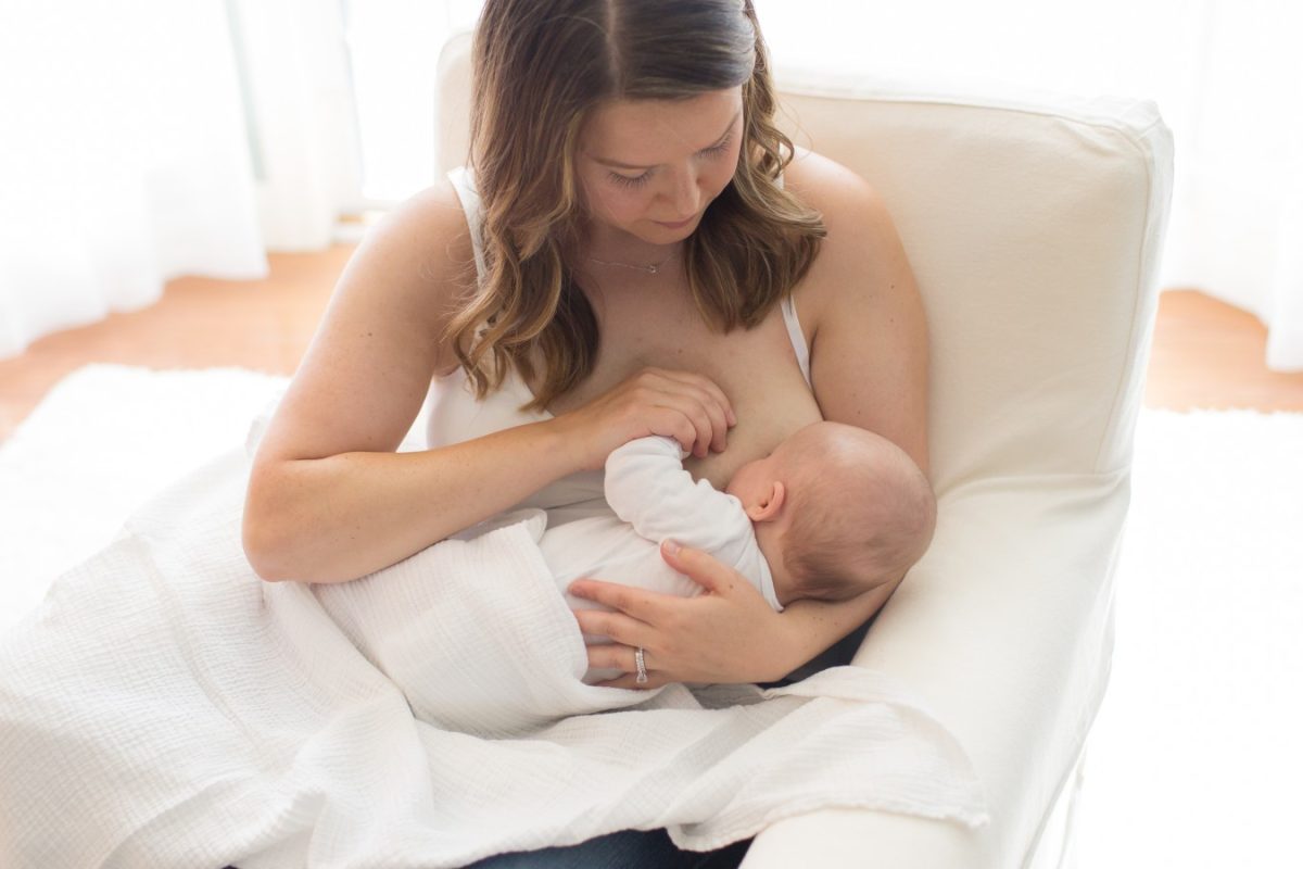 women breastfeeding baby